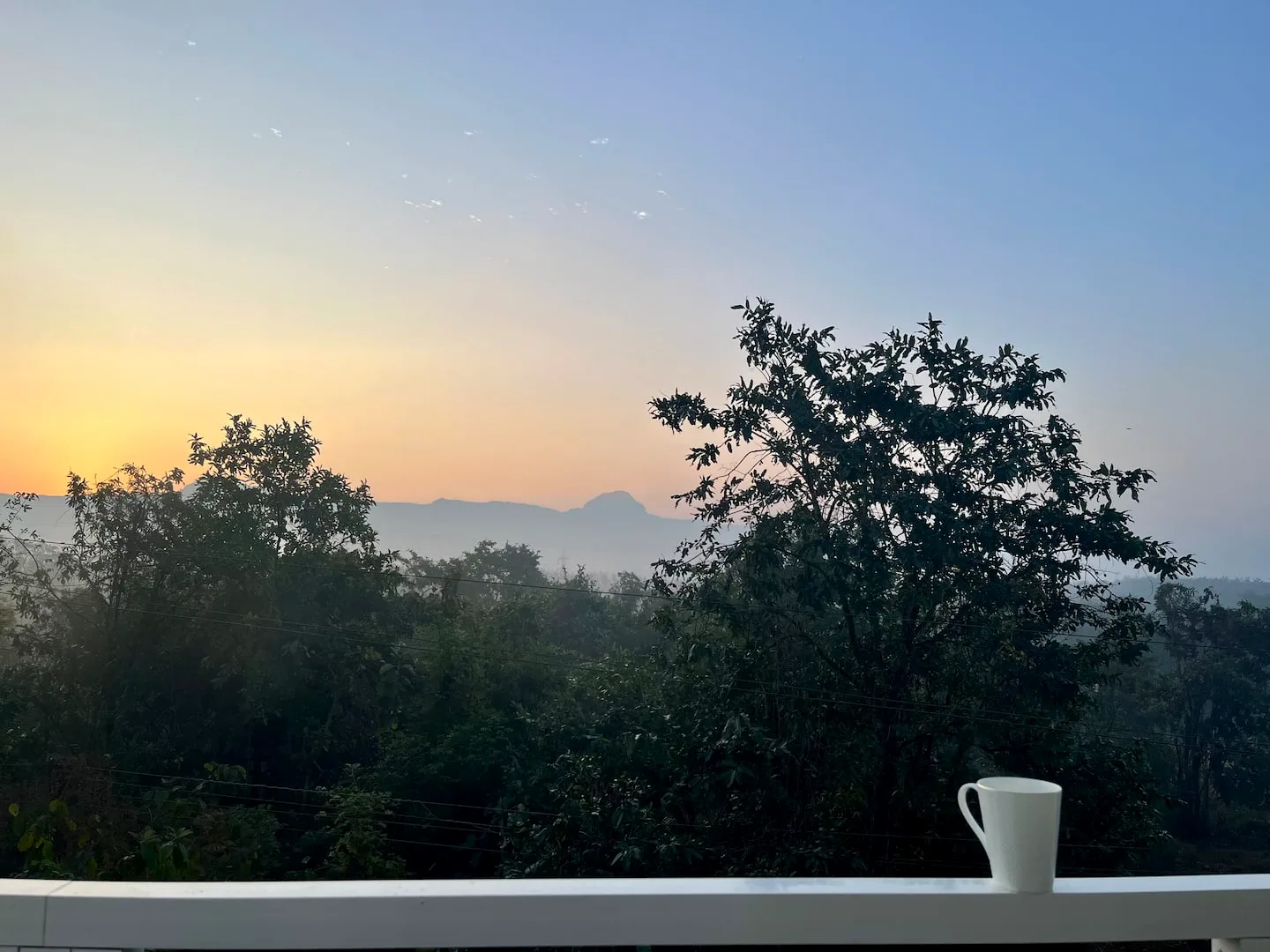 Sunrise and a cup of tea on the balcony